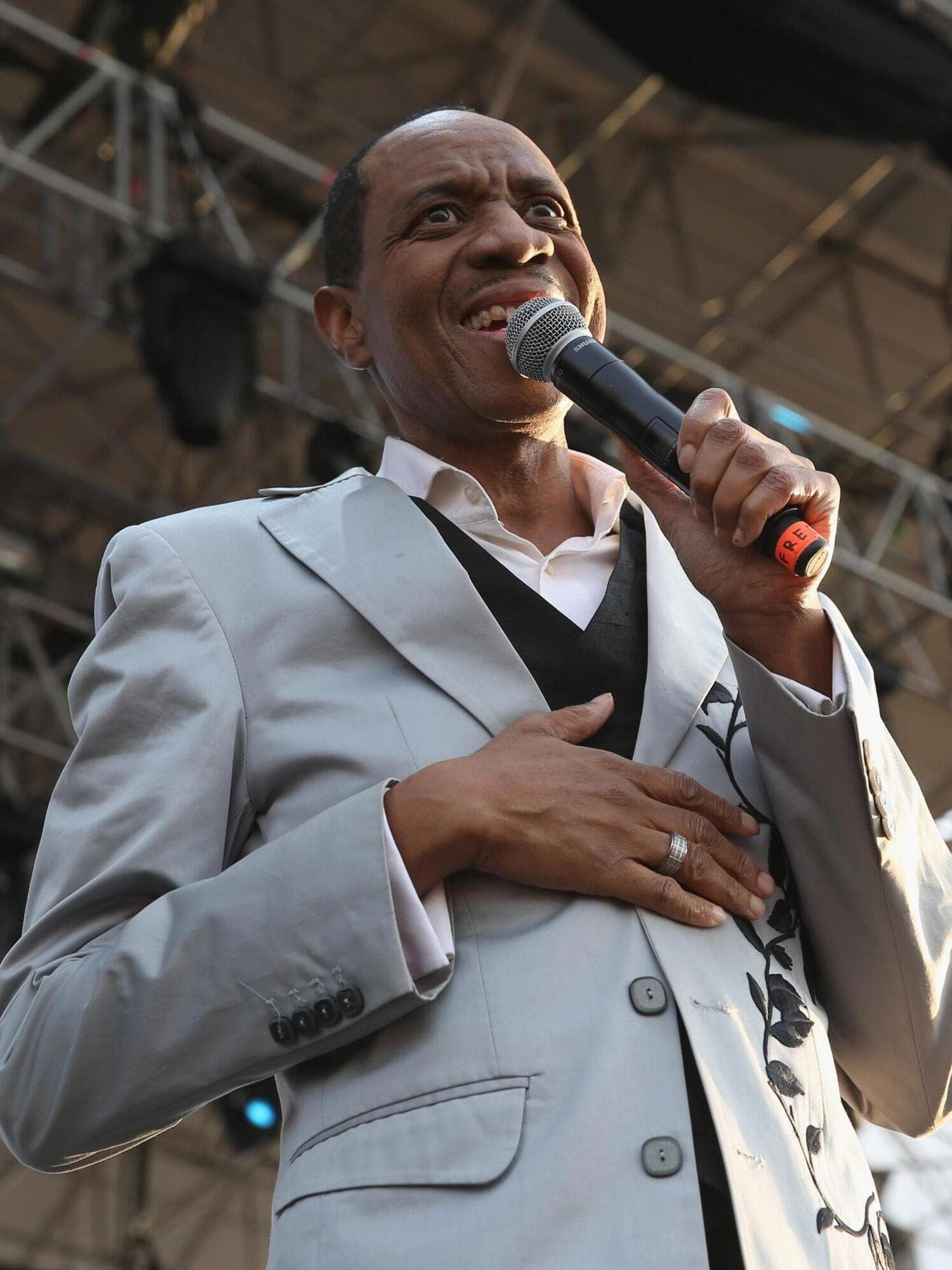 Freddie Jackson performing live on an outdoor stage