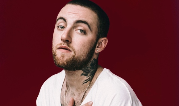 Mac Miller press photo against a red background
