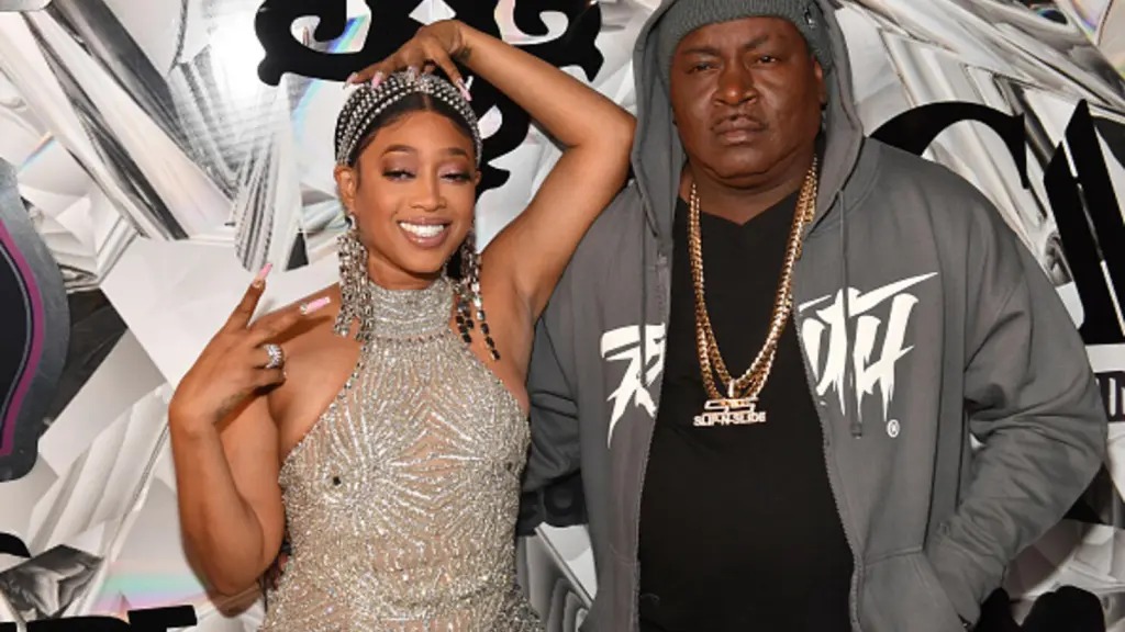 Trina and Trick Daddy posing together
